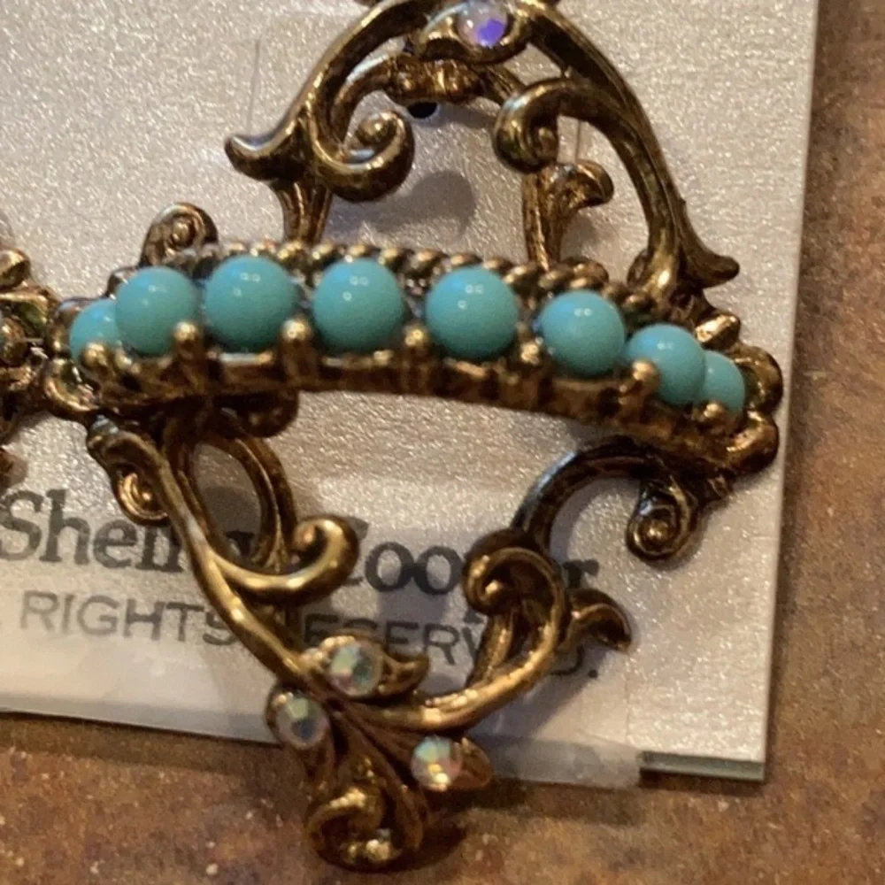 Very cool Ornate dangle earrings gold tone w/turquoise colored beads & crystals